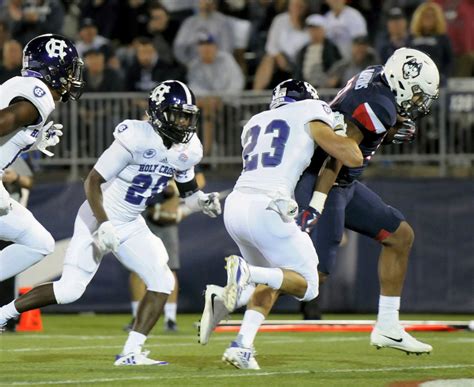 UConn football team comes from behind to beat Holy Cross - New Haven Register