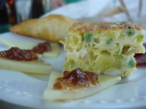 Party Snacks: Spanish-Style Tortilla (omelette) with leeks, potatoes, and peas | Hot, Cheap & Easy