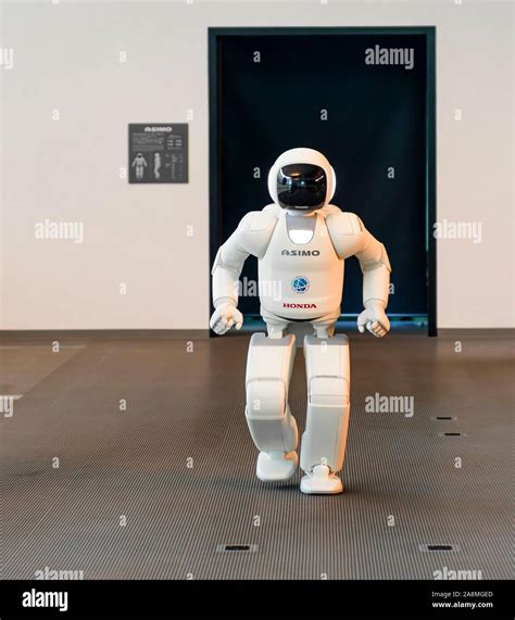Human-like ASIMO, humanoid robot by Honda, National Museum of Emerging Science and Innovation ...