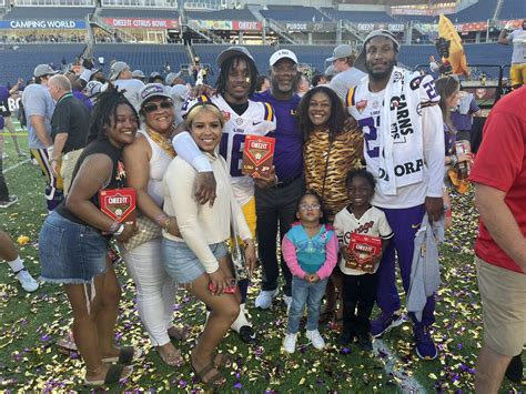 Shea Dixon on Twitter: "#LSU coach Frank Wilson and his family celebrate after his son Quad ...