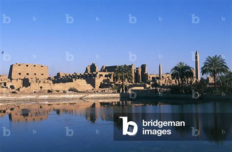 Image of The Temple Complex of Amun with sacred lake in foreground,