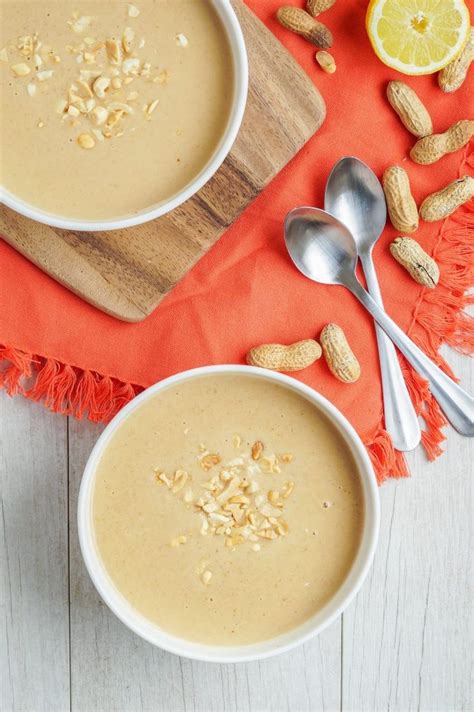 two bowls filled with oatmeal sitting on top of a table