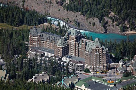 Fairmont Banff Springs Hotel with The Bow River Falls Banff Alberta Canada Photograph by George ...