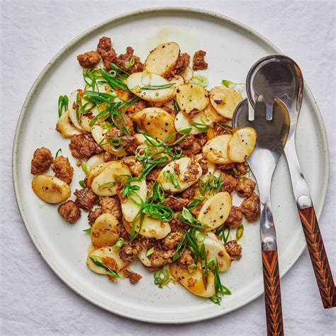 Salt-and-Pepper Pork With Crispy Rice Cakes Recipe | Epicurious