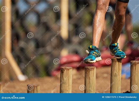 Mud race runners stock image. Image of jump, fitness - 120611575