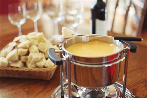 This traditional cheese fondue recipe features Emmental and Gruyere ...