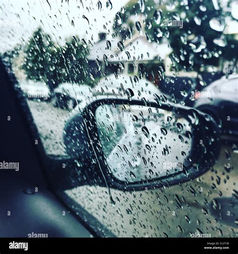 Rain on a car window Stock Photo - Alamy