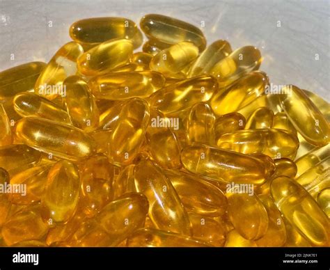 Cod liver fish oil capsules Stock Photo - Alamy