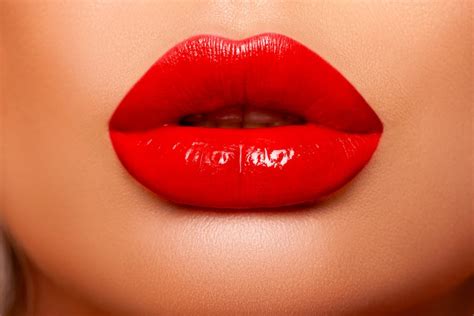 Red Lip gloss. Beautiful natural lips Red color. Sexy Lips. Beautiful Make-up Closeup. Lip Gloss ...