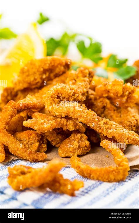 Crispy Breaded Clam Strips Snack Size. Deep Fried Breaded Clams Fingers and French Fried ...