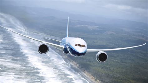 Download Wallpaper 2560x1440 Boeing 737 airplane, flying on the sea QHD Background