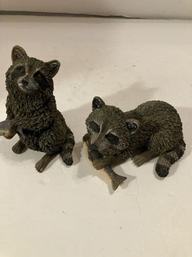 Textured Raccoons Eating Fish Figurines | eBay