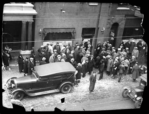 A crowd outside the Clark Street garage, owned by George “Bugs” Moran, where the St. Valentine’s ...