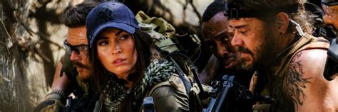 Megan Fox's Guns Are No Match for Killer Lions in Rogue Trailer