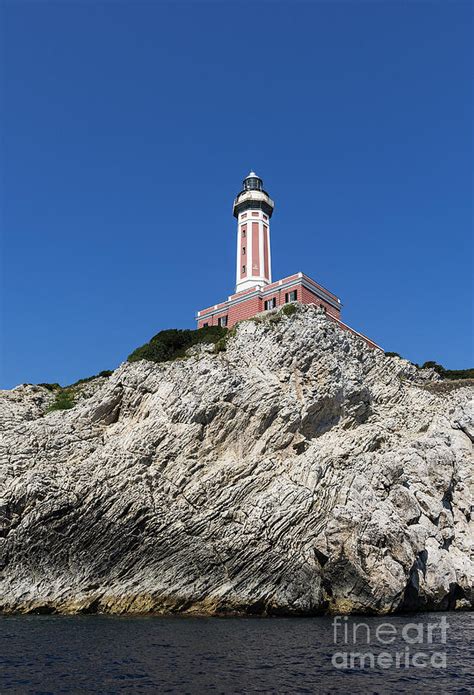 Punta Carena Lighthouse Photograph by John Greim