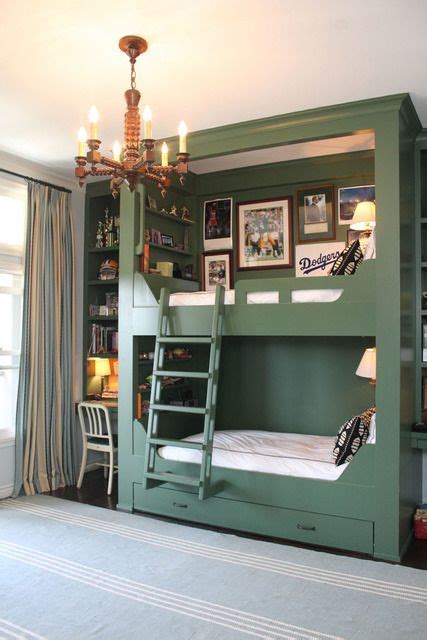 Shared boys' room with a desk/personal shelf unit on either side of the bunk beds. Plus a ladder ...