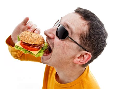 Man eating hamburger stock photo. Image of junk, school - 12942814