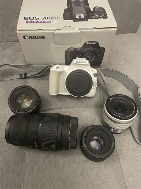 Canon EOS 200D II with basic kit lens and 3 extra lenses, Photography, Cameras on Carousell