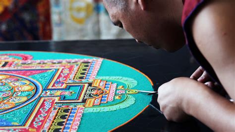 Tibetan Monks create mandala sand painting at STLCOP | ksdk.com