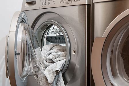 Royalty-Free photo: Red and yellow front-load washing machines | PickPik