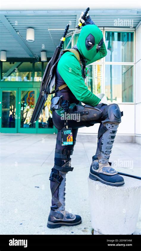 Attendee cosplayer portraying Green Deadpool at Comic Con in Los ...