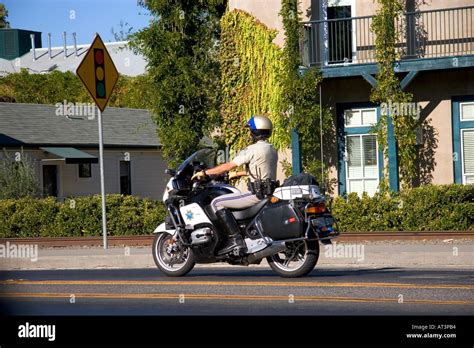 California Highway Patrol officer riding a motorcycle Stock Photo - Alamy