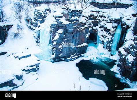 Frozen Waterfall Landscape in Abisko National Park, Sweden in Winter ...