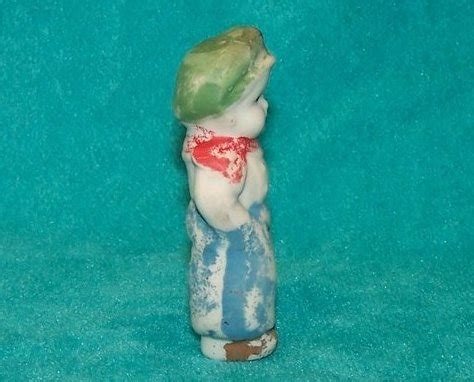 Boy in Blue Ceramic Figurine