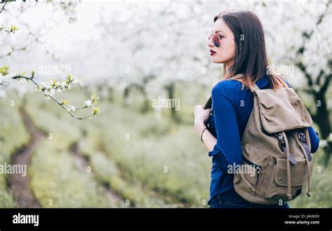 Young woman walking in nature Stock Photo - Alamy