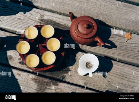 Tea ceremony, Woman pouring traditionally prepared tea Stock Photo - Alamy