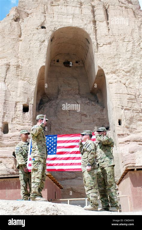 A US Army re-enlistment at the base of one of the giant Buddha statues ...