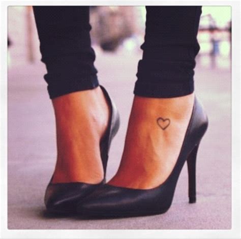 Black women’s high-heels and heart tattoo