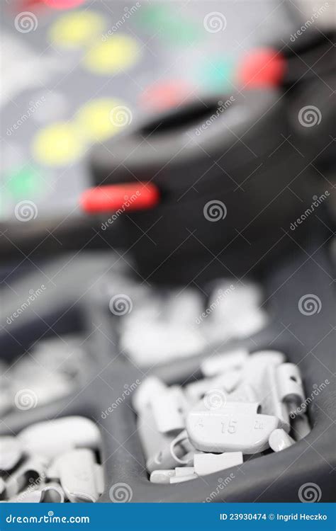 Wheel balance weights stock photo. Image of servicing - 23930474