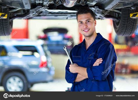 Car Mechanic Workshop Stock Photo by ©pikselstock 175369820