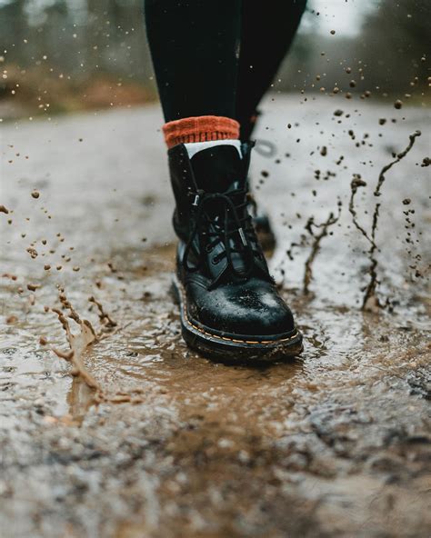 Person Wearing Black Leather Work Boots · Free Stock Photo