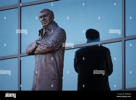 MANCHESTER, UK - MAY 19 2018: Sir Alex Ferguson Bronze statue in front ...