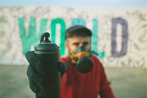 "Man Painting In A Graffiti Wall" by Stocksy Contributor "CACTUS Creative Studio" - Stocksy