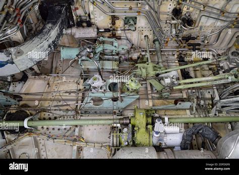 Controls mechanisms inside the left landing gear bay of the first ...