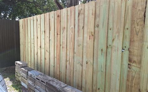 Wood Fence Installation - Mechanical Aluminum Fence Installation ...