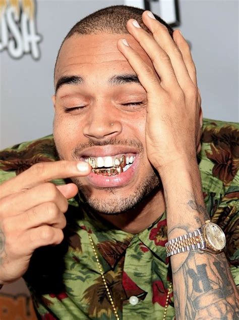 Something tells us Chris Brown is feeling VERY proud of his grillz in ...