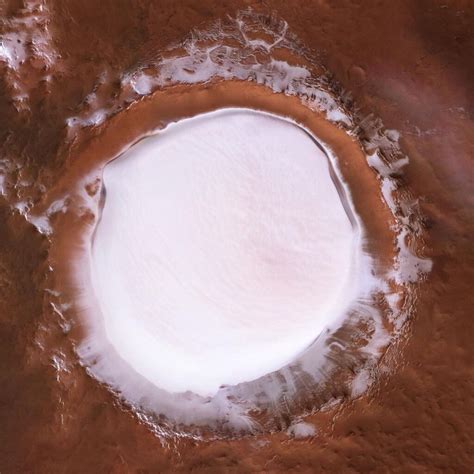 Stunning Photos Show Huge Crater on Mars Full of Ice - Hasan Jasim