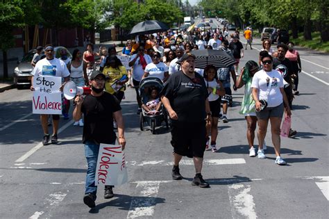 Community members march to demand an end to shootings in Albany ...