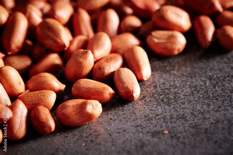 Peanuts with skins Stock Photo | Adobe Stock