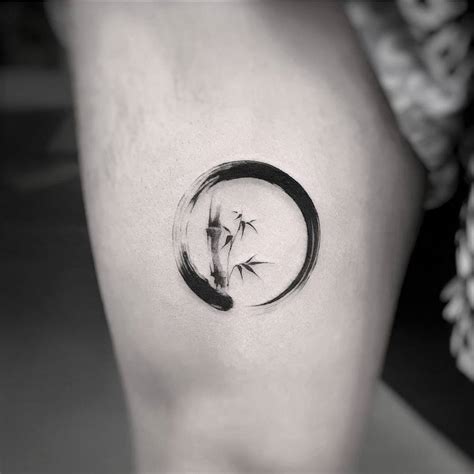 Enso tattoo on the thigh