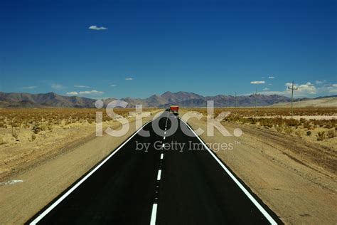 Straight Road In The Desert Stock Photo | Royalty-Free | FreeImages