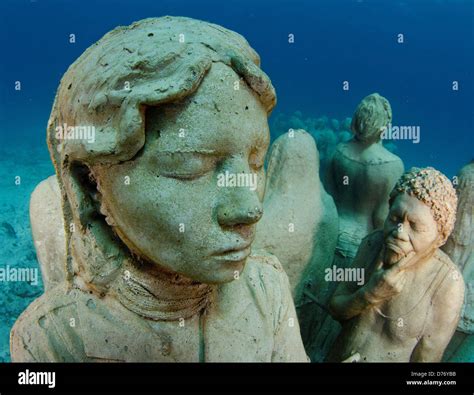 Mexico Cancun Sculptures at bottom sea in Cancun Underwater Museum in ...