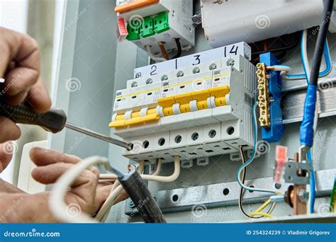 Connecting Wires To Circuit Breaker Fuse Box in Consumer Unit of Distribution Panel. Stock Image ...