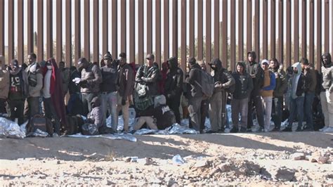 Migrants walk through closed border crossing in Arizona | 12news.com