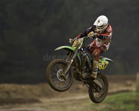 Motorcross rider stock photo. Image of 15041000, landing - 3895440