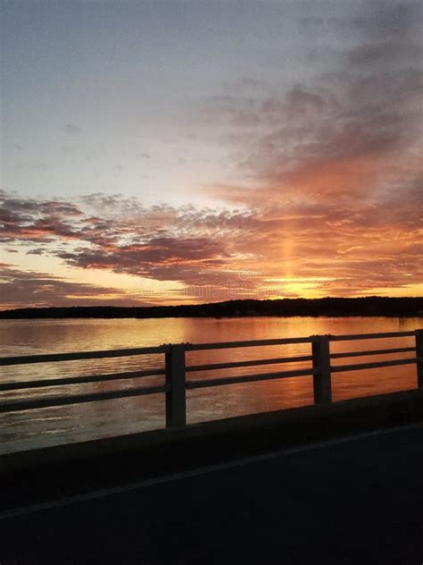 Sunset on the bridge stock photo. Image of water, bridge - 163589172